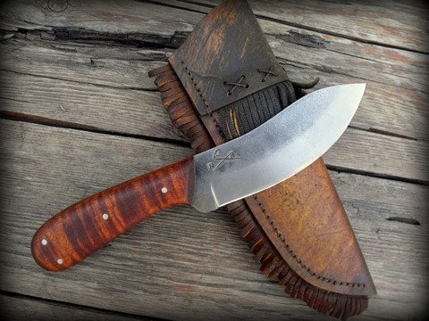 Nessmuk knife with rawhide sheath