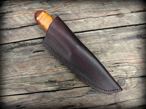 hand made custom knife with a leather sheath