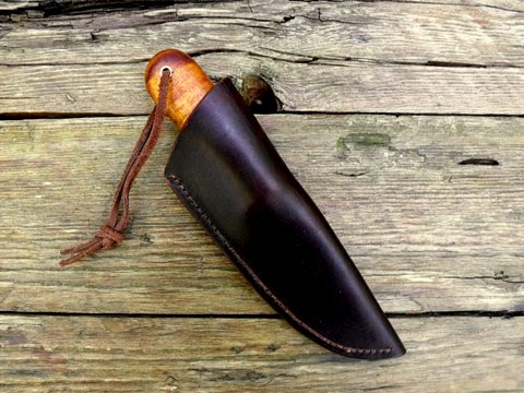 vintage style knife with a leather sheath