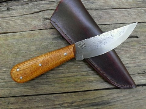 hand forged custom fur trade roach belly knife.