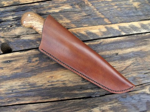 period knife with a leather sheath